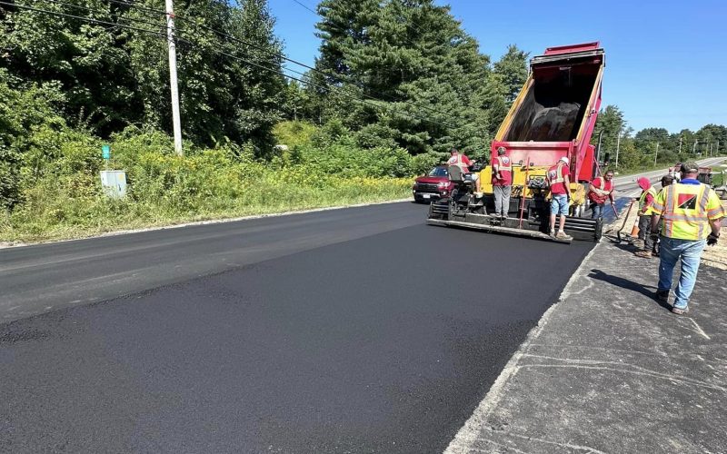 dump truck dumping asphalt