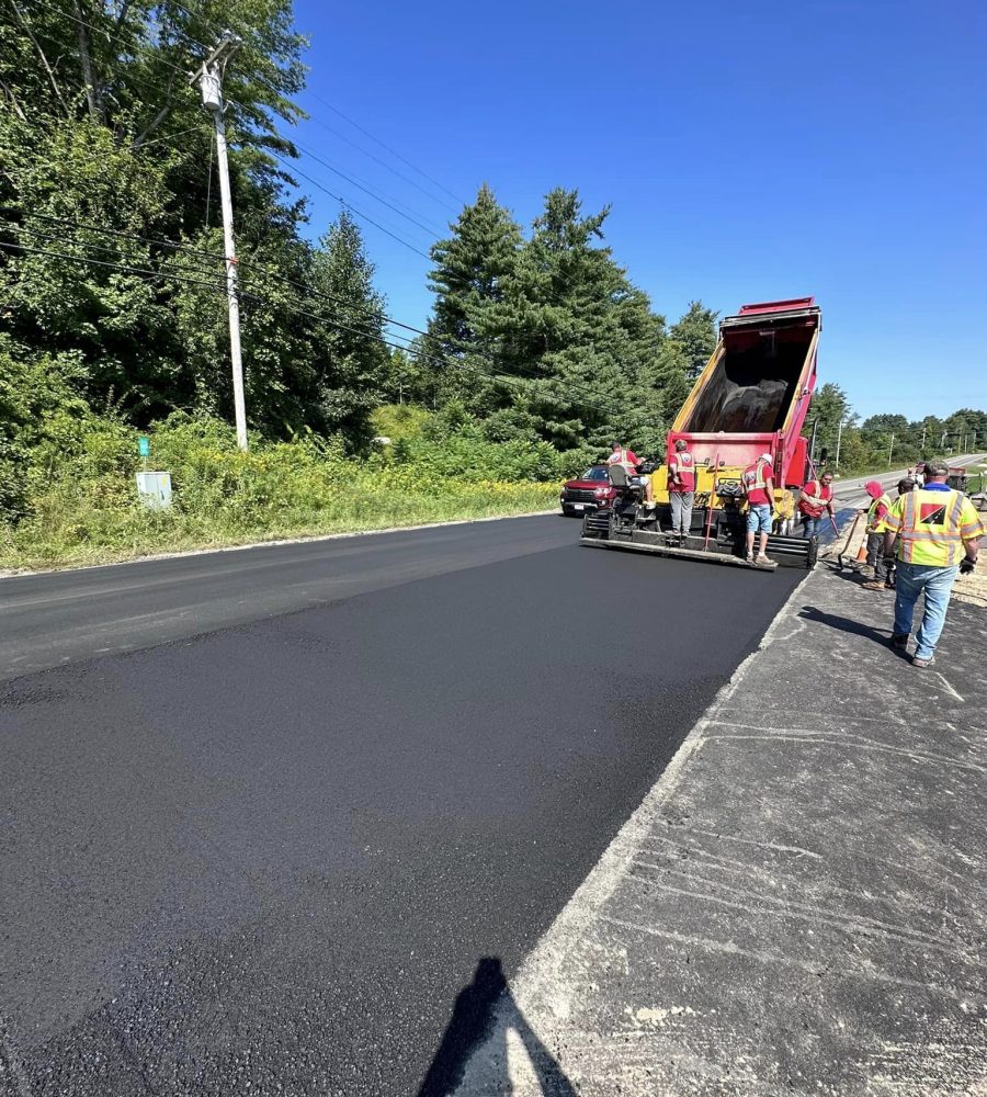 dump truck dumping asphalt